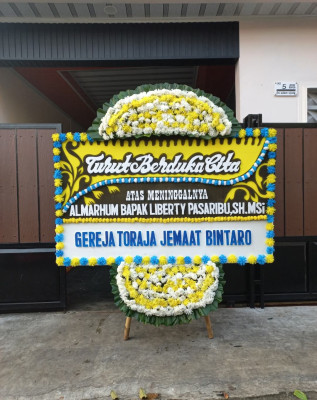Papan Bunga Duka di Kampung Empat